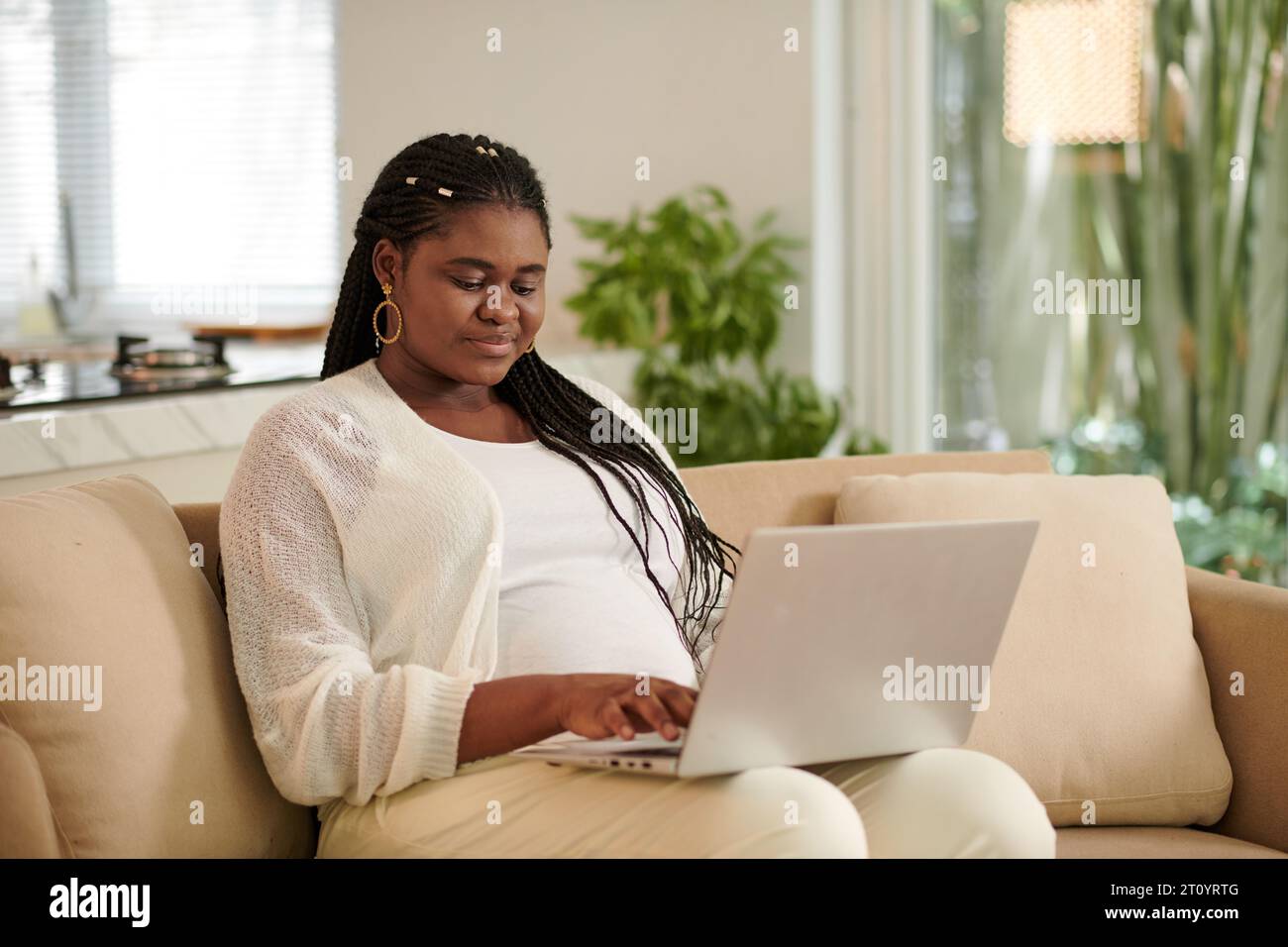 Cheerful positive black woman hi-res stock photography and images - Alamy