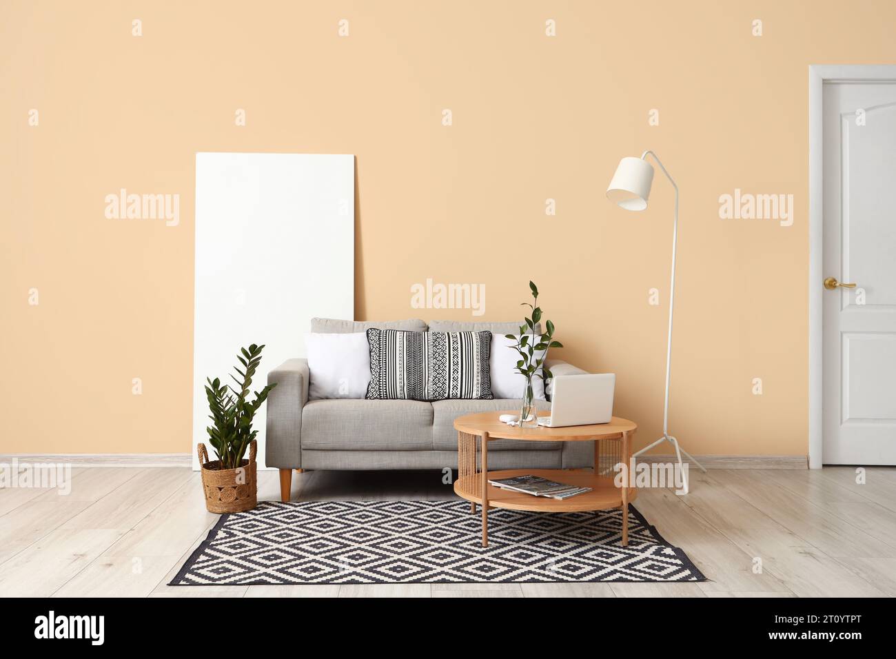 Interior of stylish living room with cozy sofa, coffee table and ...