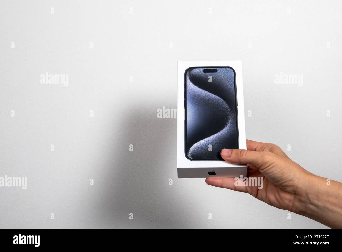 Sigulda, Latvia - October 9, 2023: Iphone 15 Pro in a box in the hand