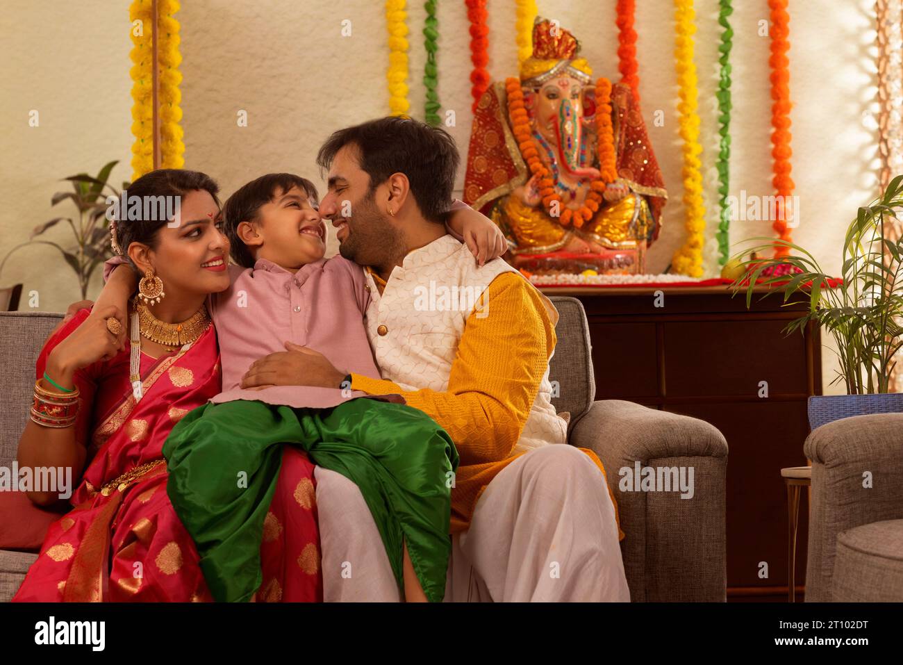 Maharashtrian family celebrating Ganesh Chaturthi Stock Photo