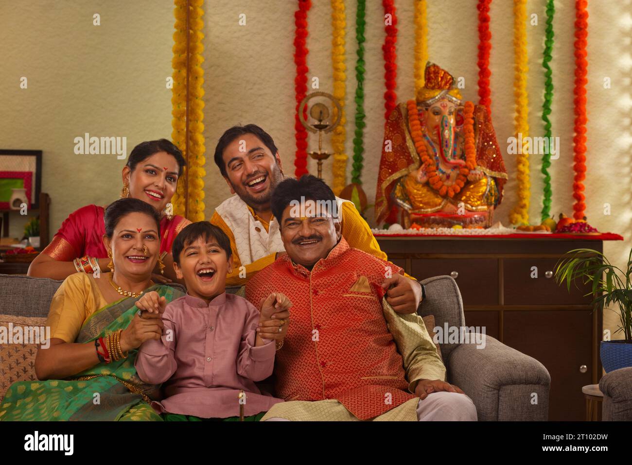 Maharashtrian family celebrating Ganesh Chaturthi festival Stock Photo