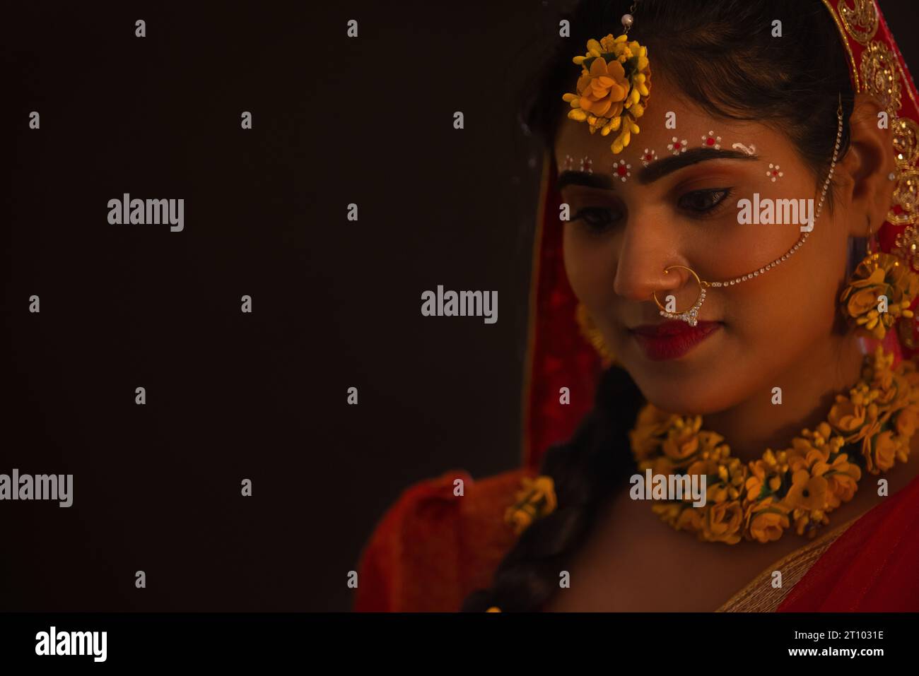 Close-up portrait of young woman dressed up as Lord Radha on the occasion of Janmashtami Stock Photo