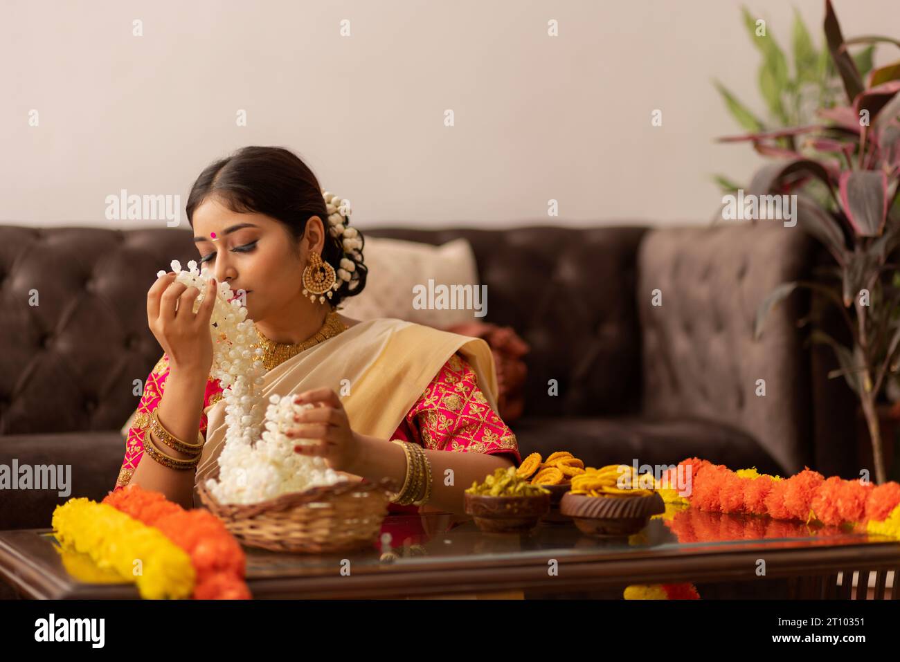 Indian woman in white saree hi-res stock photography and images - Alamy