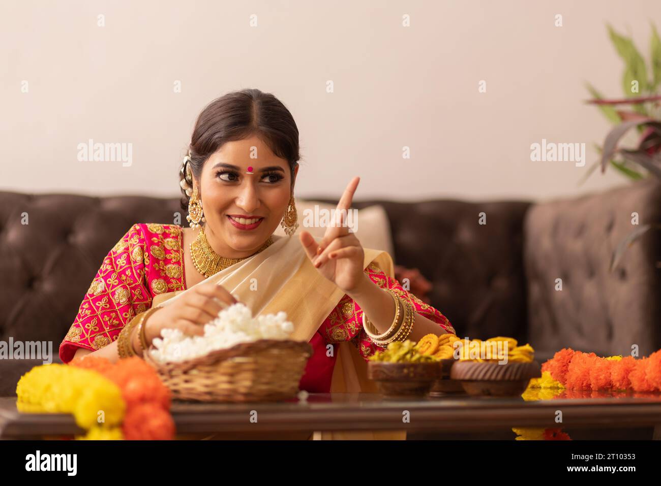 Indian woman in white saree hi-res stock photography and images - Alamy