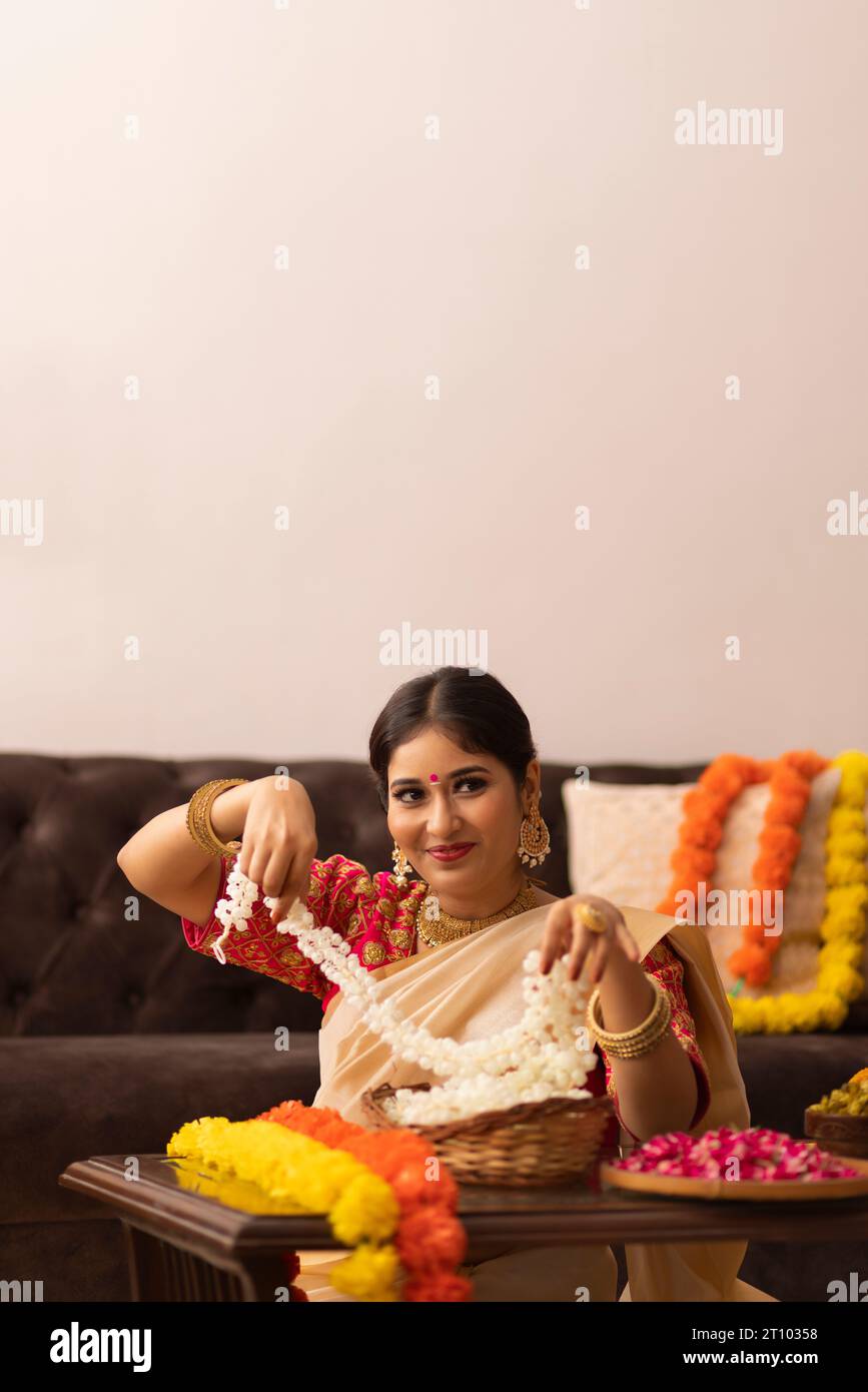 Indian woman in white saree hi-res stock photography and images - Alamy