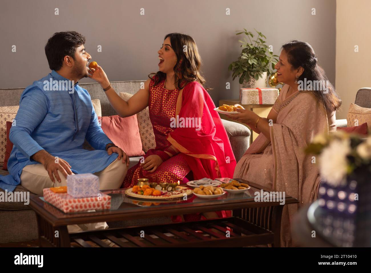 Happy Indian family celebrating Raksha Bandhan Stock Photo - Alamy