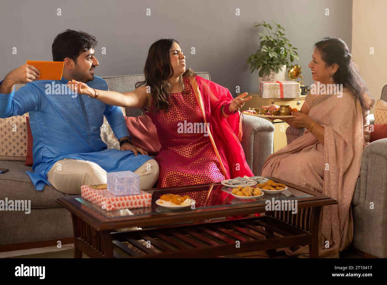 Happy Indian family celebrating Raksha Bandhan Stock Photo - Alamy