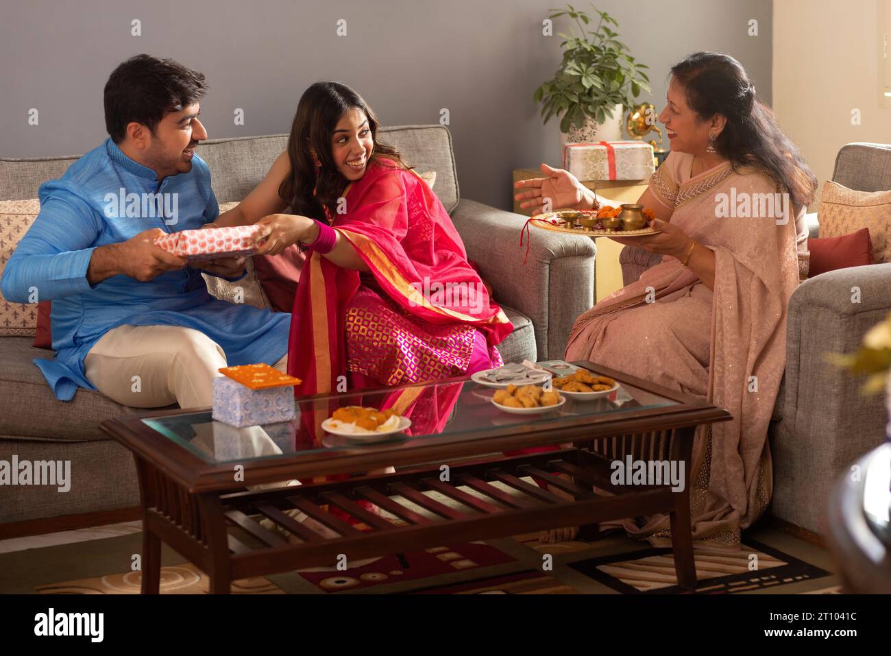 Happy Indian family celebrating Raksha Bandhan Stock Photo - Alamy