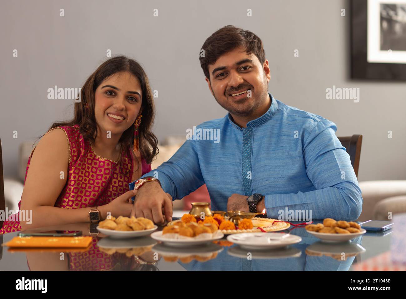 Sibling celebrating Raksha Bandhan festival at home Stock Photo
