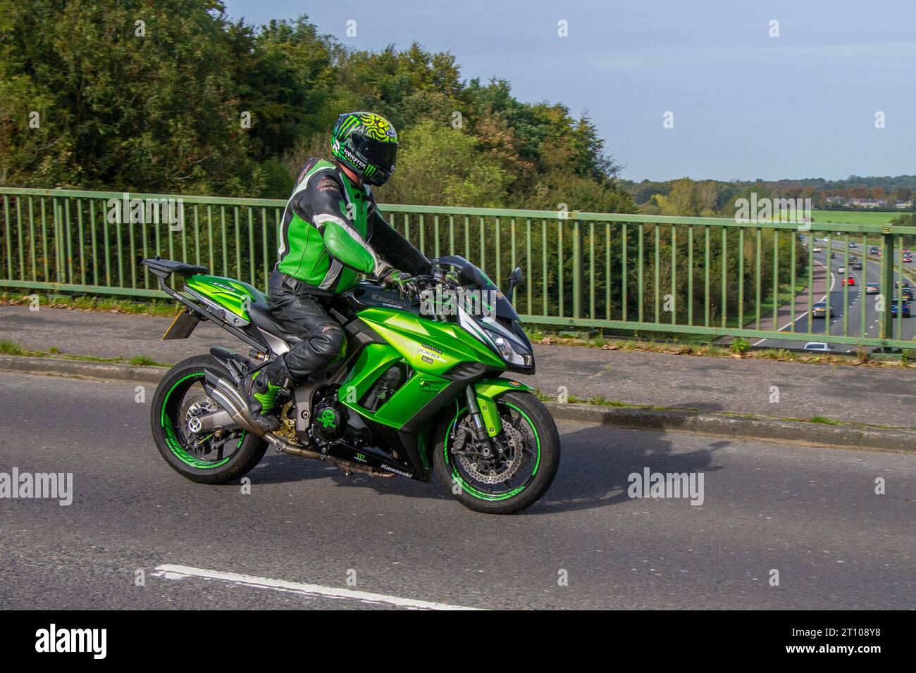 2014 Kawasaki Zx 1000 Gbf Inline Four Green Motorcycle Sports Tourer Petrol 1043 cc crossing motorway bridge in Greater Manchester, UK Stock Photo