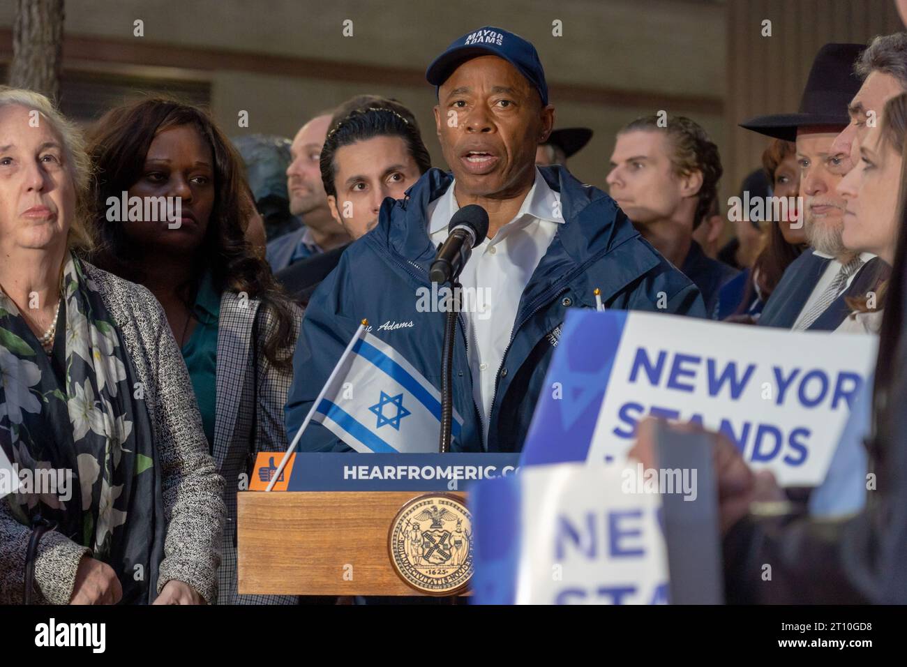 New York City Mayor Eric Adams speaks at a Candlelight Vigil for Victims of Terrorist Attacks in Israel at Manhattan's Golda Meir Square in New York City. On October 7, the Palestinian militant group Hamas launched a surprise attack on Israel from Gaza by land, sea, and air, killing over 900 people and wounding more than 2000.  According to reports, 130 Israeli soldiers and civilians have also been kidnapped by Hamas and taken into Gaza. The attack prompted a declaration of war by Israeli Prime Minister Benjamin Netanyahu, and ongoing retaliatory strikes by Israel on Gaza killing hundreds. (Ph Stock Photo