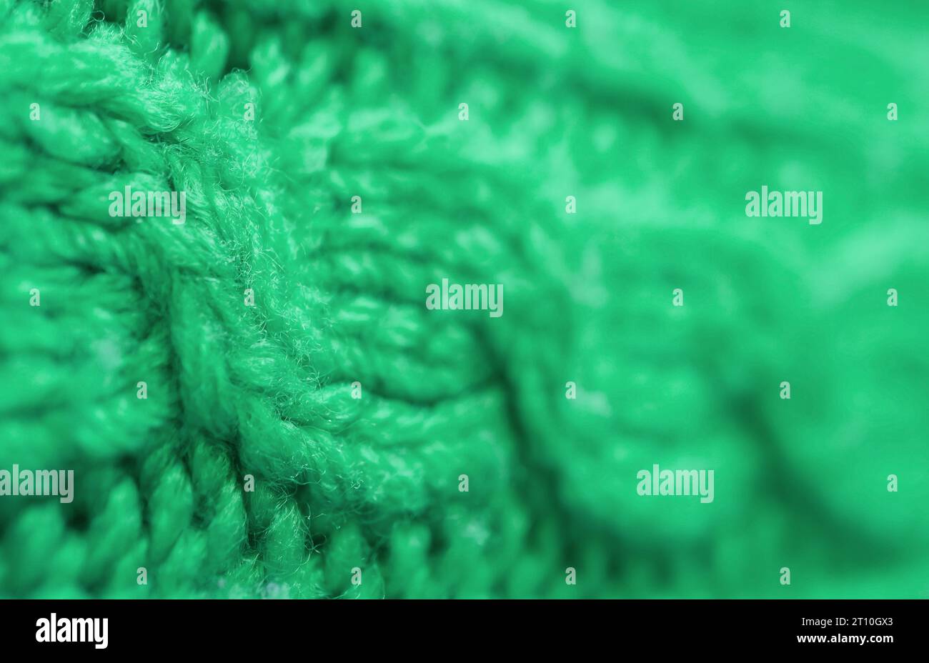 Texture knitted green fabric hi-res stock photography and images - Alamy