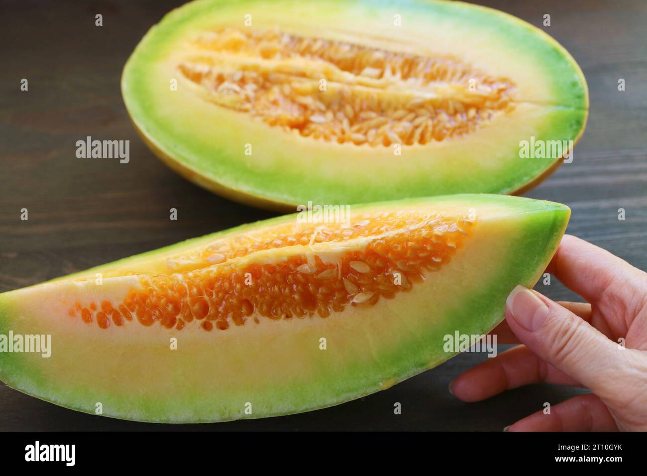 Closeup a Slice of Fresh Ripe Juicy Thai Musk Melon Stock Photo