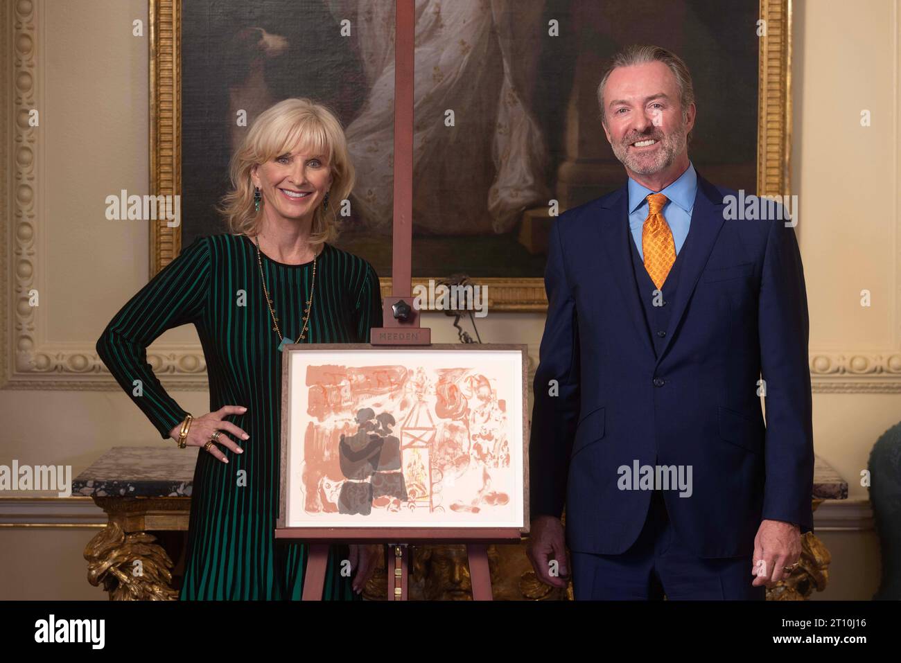 EDITORIAL USE ONLY Matthew Orr and Sybil Robson Orr unveil a new piece of artwork entitled 'Ngaben' at 10 Downing Street, as British artist Michael Armitage is announced as the winner of the Robson Orr TenTen Award 2023 by the Government Art Collection, London. Picture date: Tuesday October 10, 2023. Stock Photo