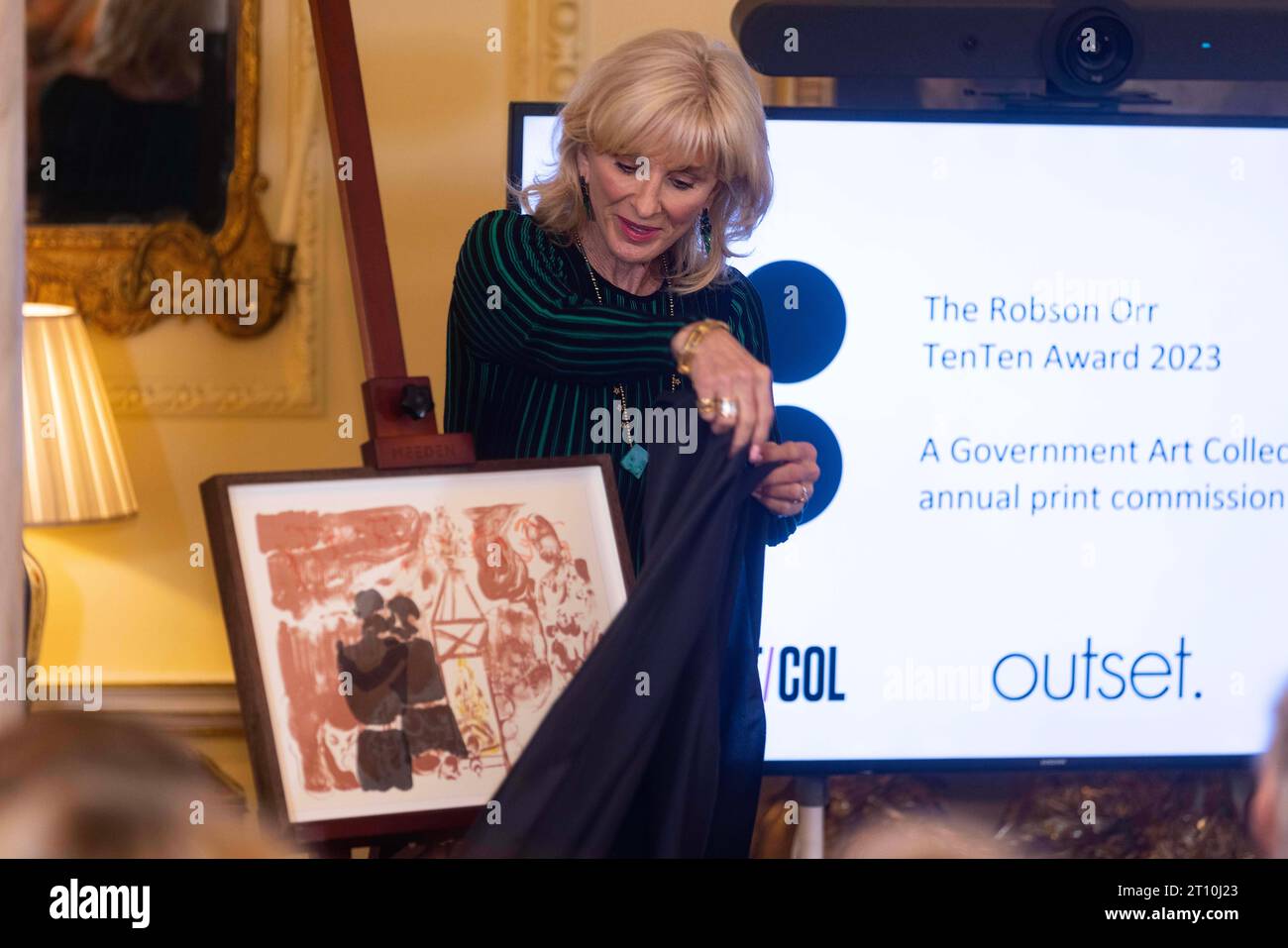 EDITORIAL USE ONLY Sybil Robson Orr unveils a new piece of artwork entitled 'Ngaben' at 10 Downing Street, as British artist Michael Armitage is announced as the winner of the Robson Orr TenTen Award 2023 by the Government Art Collection, London. Picture date: Tuesday October 10, 2023. Stock Photo