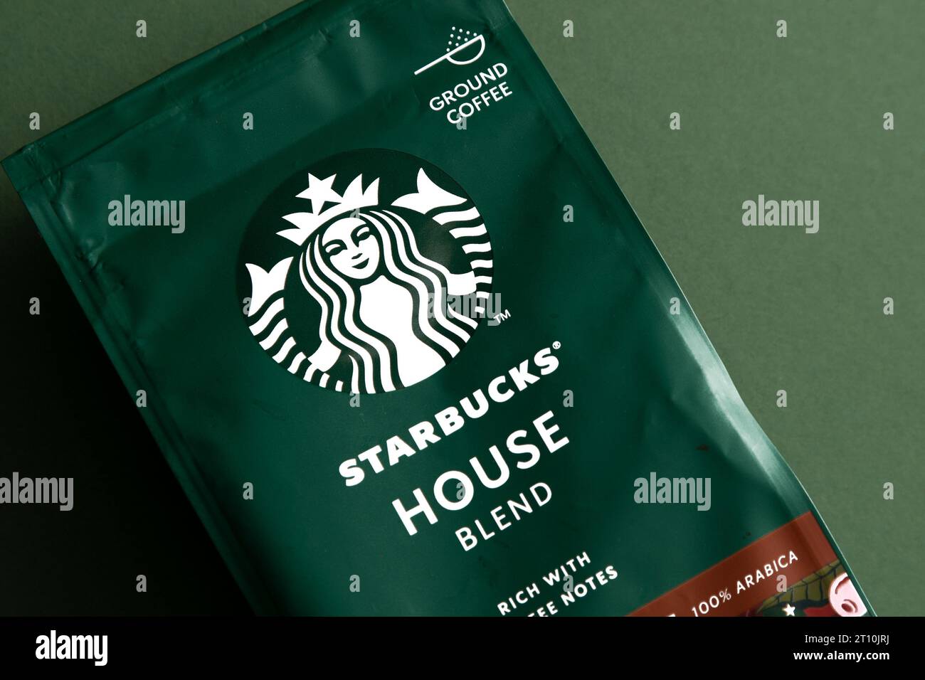 Starbucks coffee packaging. Green pattern background. House blend