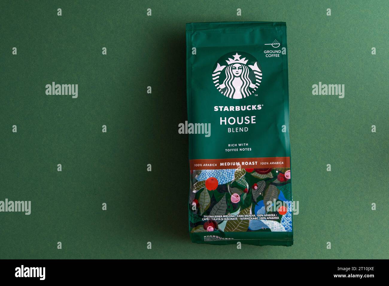 Starbucks coffee packaging. Green pattern background. House blend