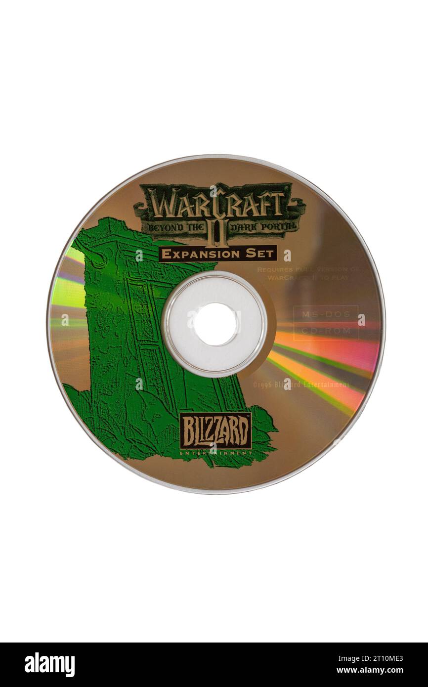 Warcraft II Tides of Darkness deluxe-edition computer game discs isolated on white background Stock Photo