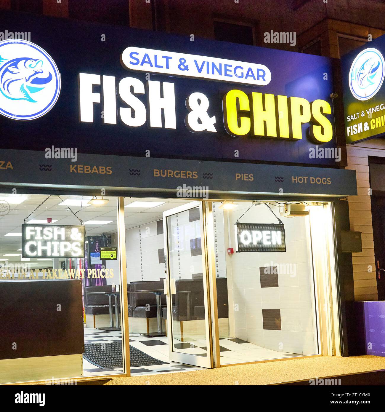 Front of a Blackpool fish and chip shop at night Stock Photo Alamy