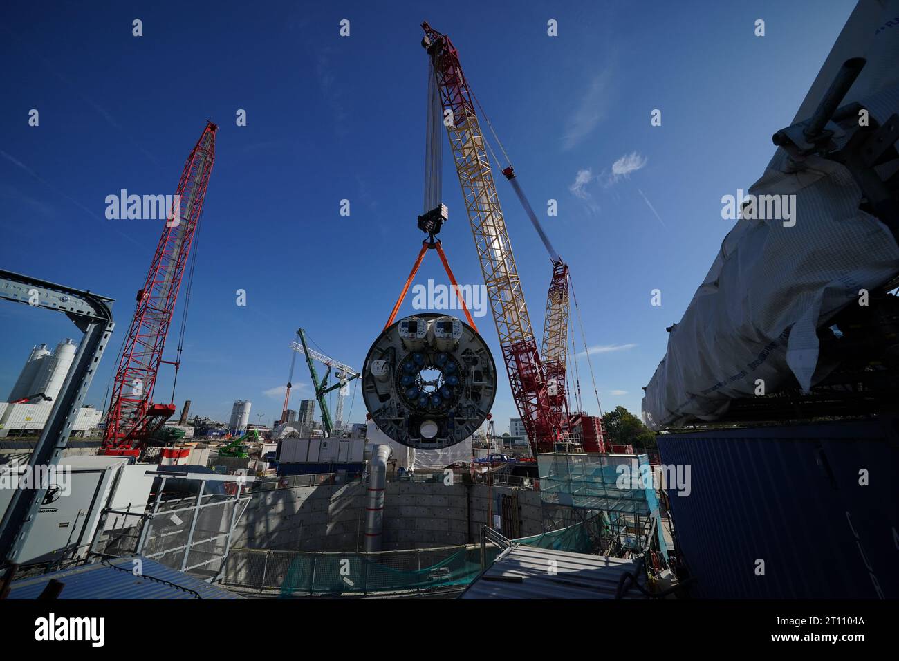 The front shield from the 2,000-tonne tunnel boring machine (TBM), as yet unnamed, is lifted into the Victoria Road Crossover Box ancillary shaft at the HS2 site, near to Old Oak Common in west London. Picture date: Tuesday October 10, 2023. Stock Photo