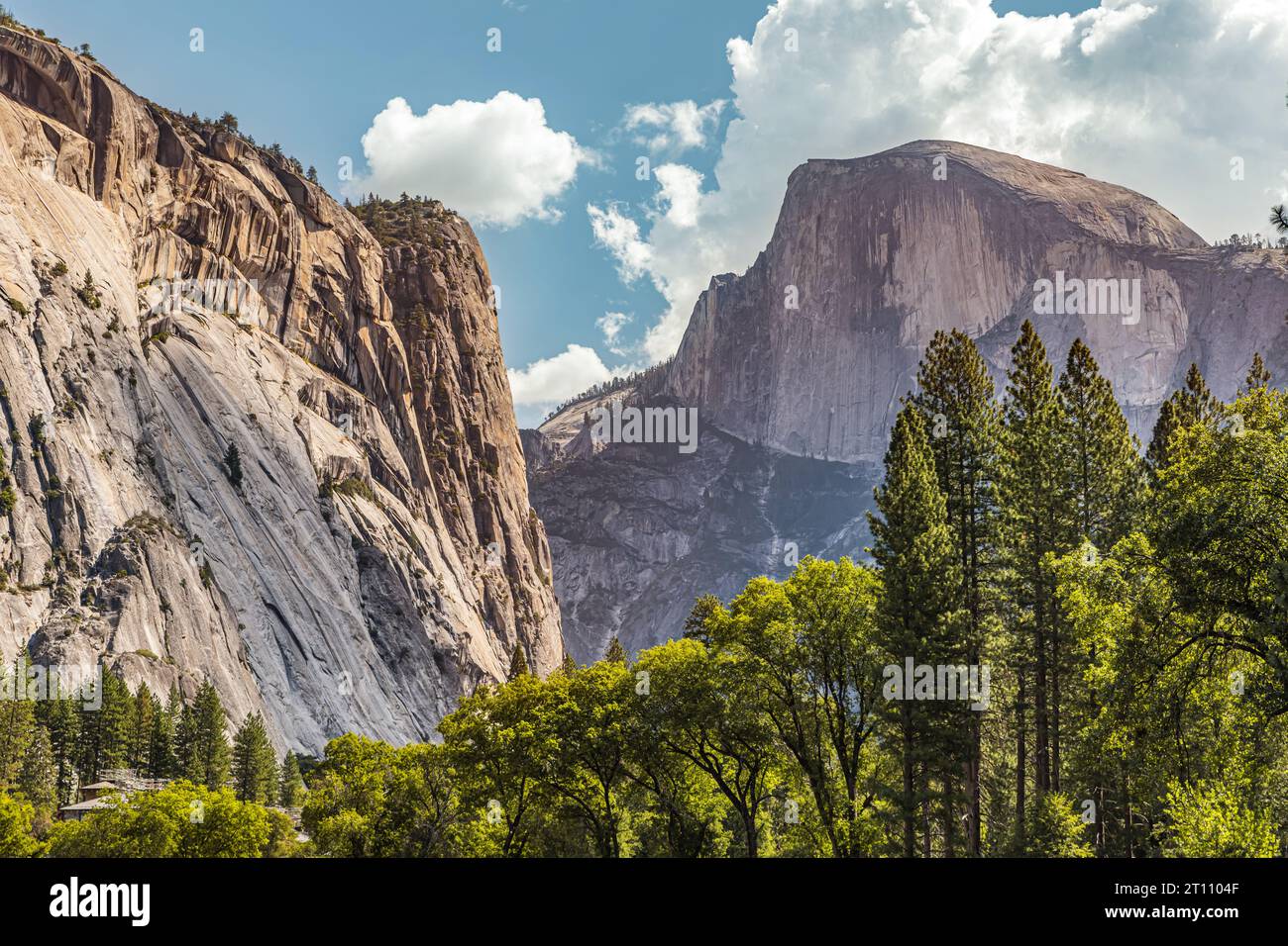 Half Dome is an impressive peak in Yosemite National Park, known for its distinctive shape and breathtaking views. Stock Photo