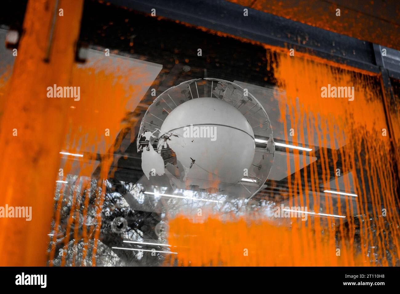 Ben, a 21yearold student, paints a building at the University of