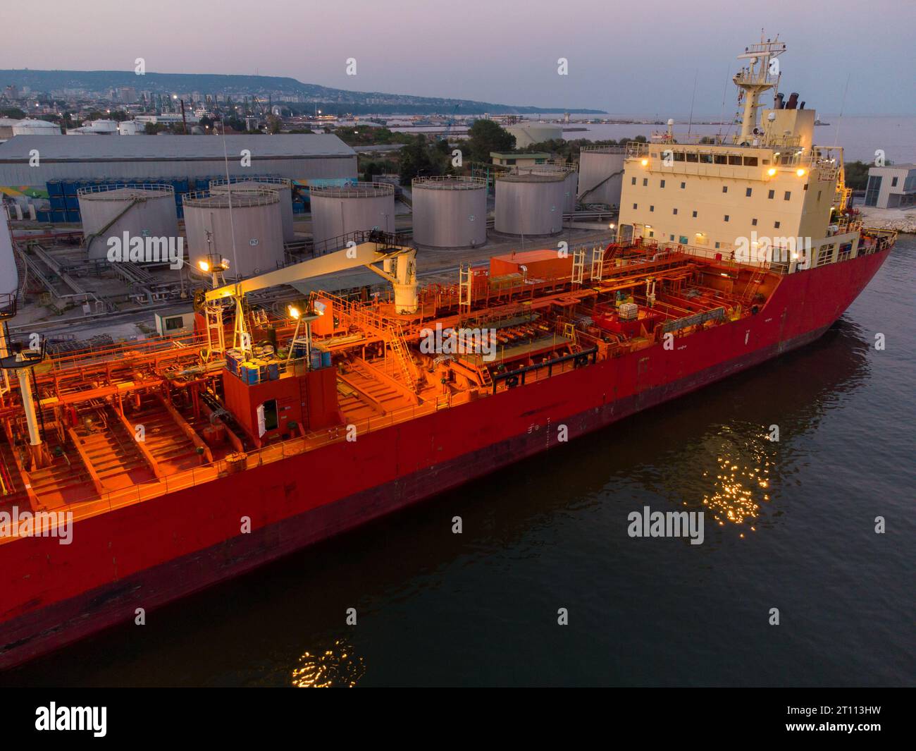 Aerial top view of oil ship tanker and lpg ship at industrial port at ...