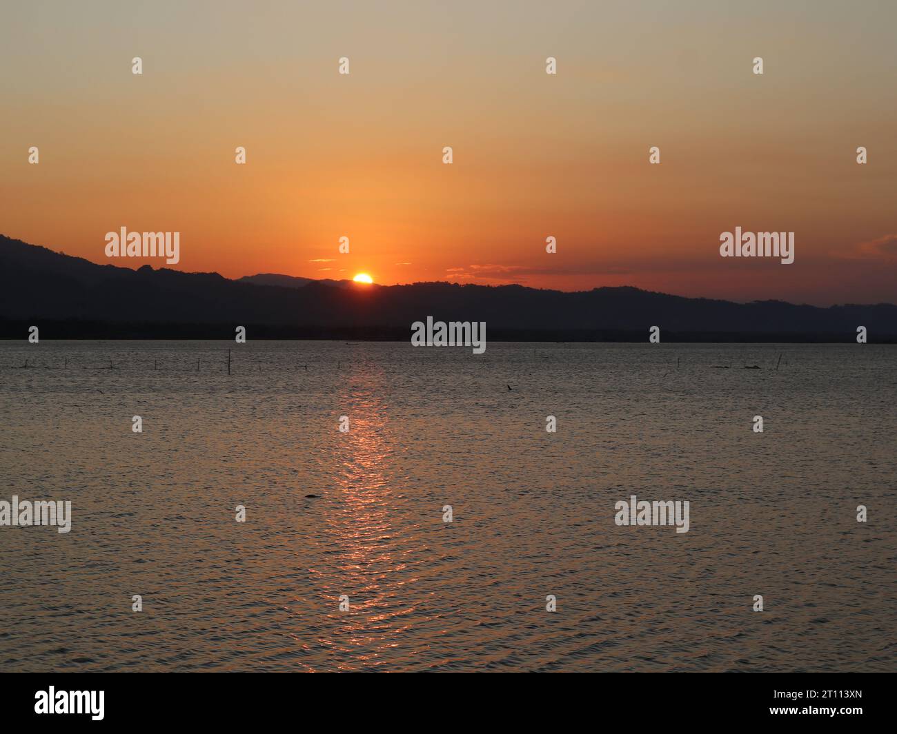 Beautiful golden sunset on the lake Stock Photo - Alamy