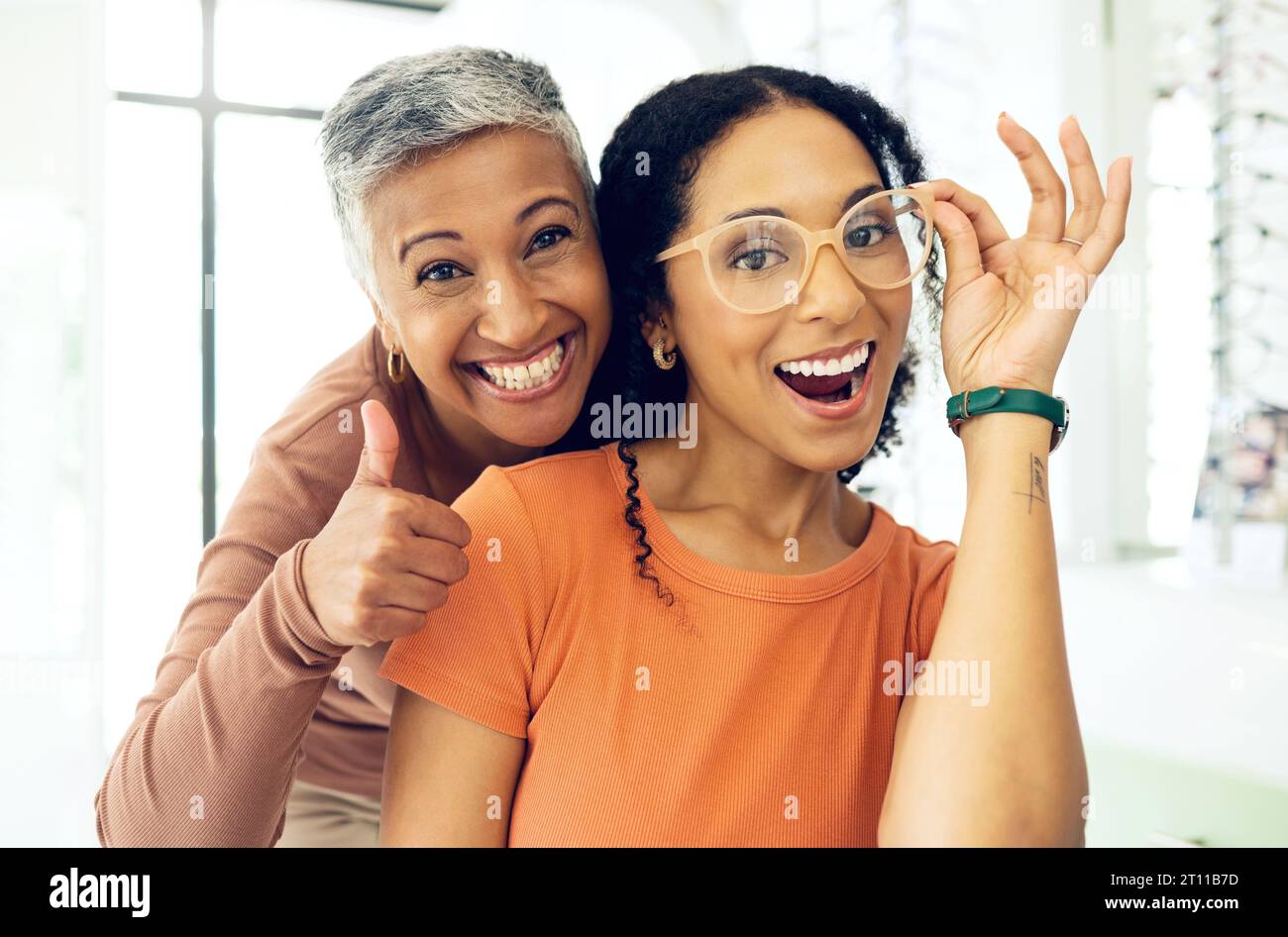 Optometry, thumbs up or happy woman with glasses for vision in a retail