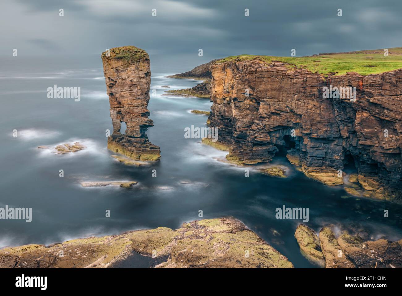 Yesnaby Castle is a famous two-legged sea stack near Sandwick on the Mainland in Orkney, Scotland. Stock Photo