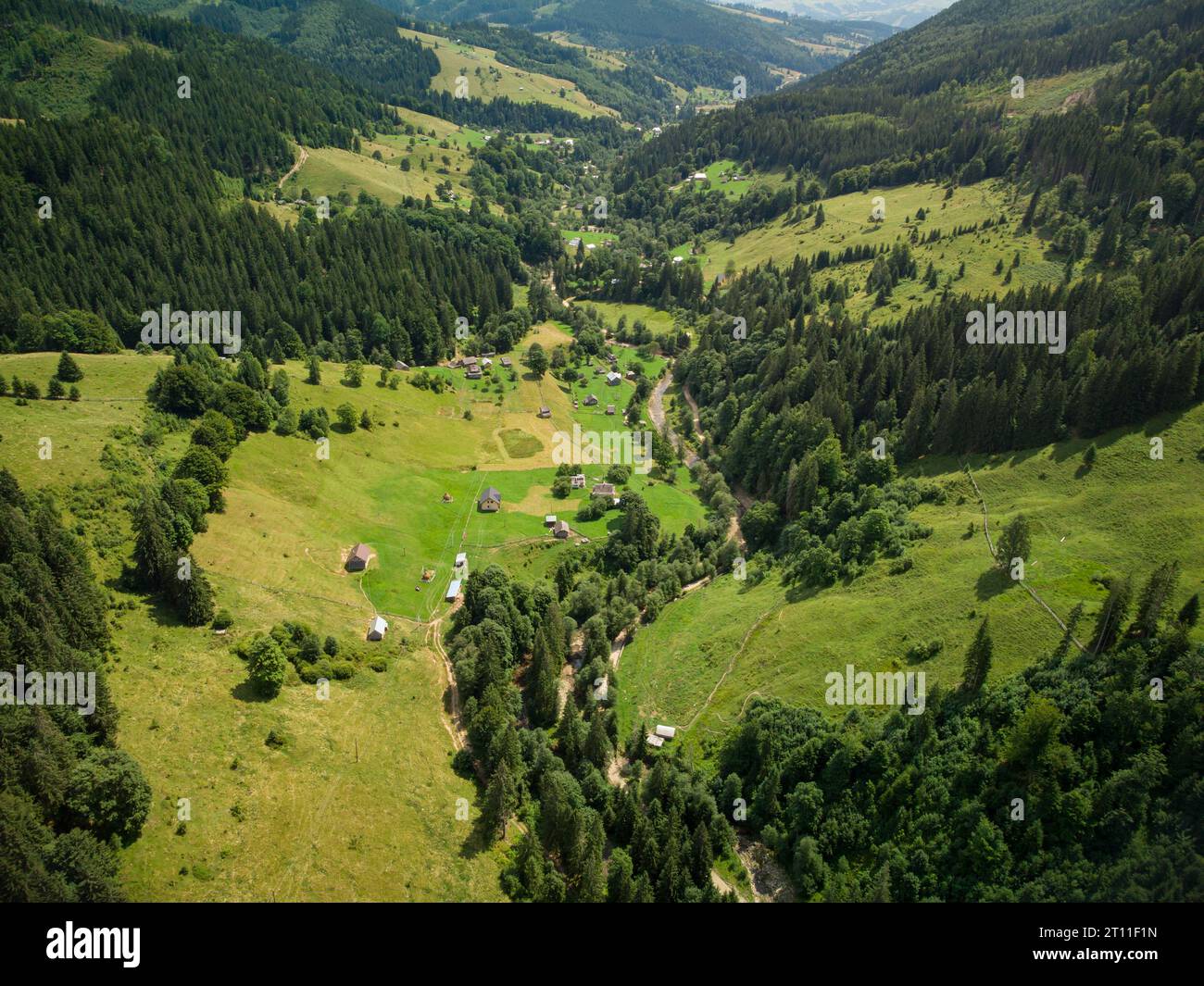 Aerial top down view of Mountain Village in Carpathians in Summer day ...