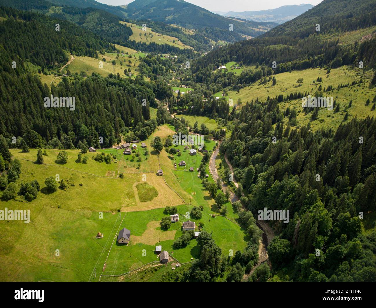 Aerial top down view of Mountain Village in Carpathians in Summer day ...