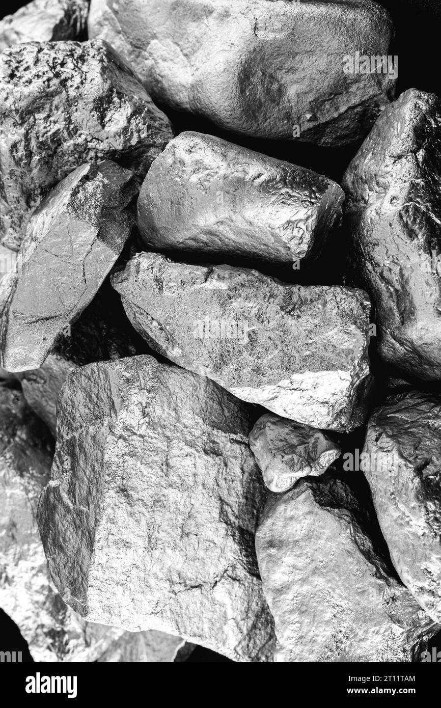 Raw manganese. Manganese stone isolated on black background. Mineral