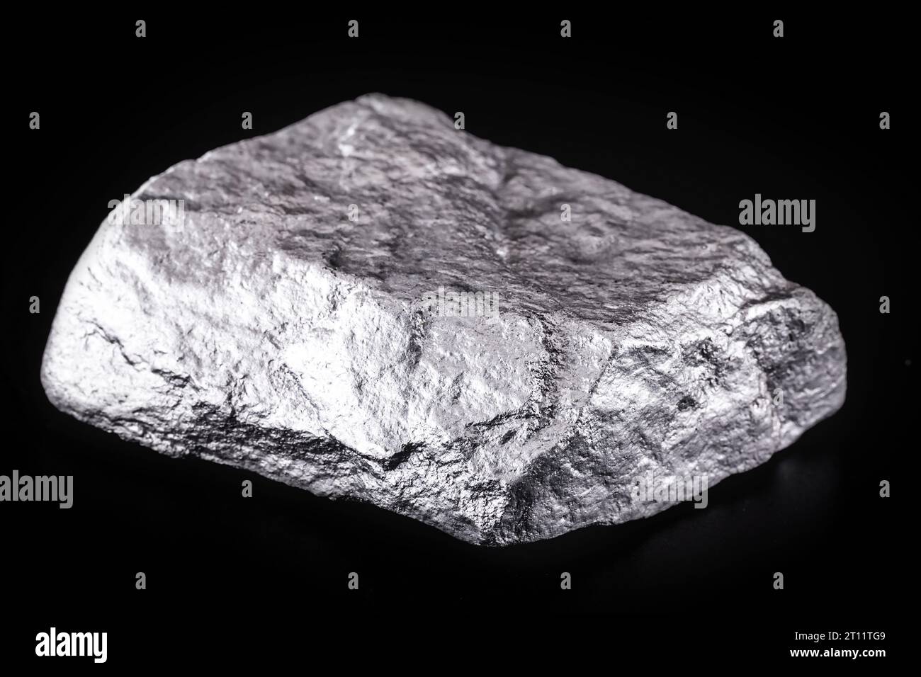 small titanium stone, metal used in light alloys. Macro photography of