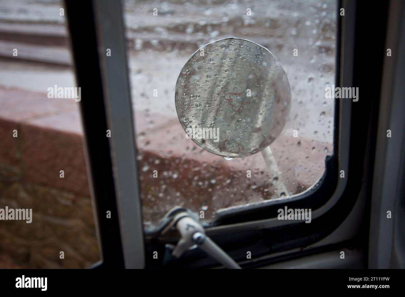 View of road in rainy window hi-res stock photography and images - Alamy