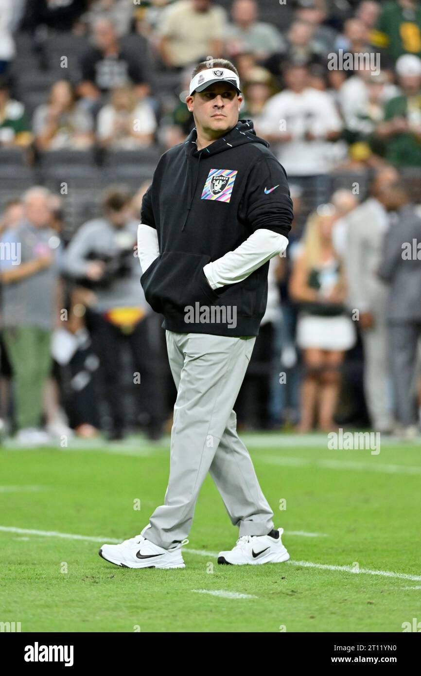 Las Vegas Raiders head coach Josh McDaniels walks on the field before an NFL football game