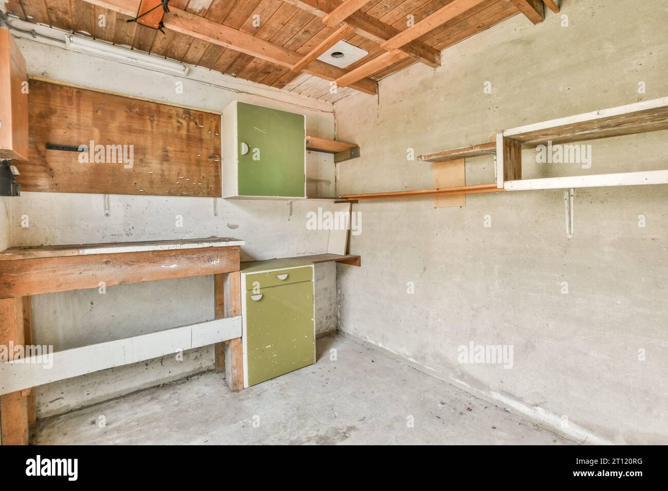 an old kitchen that has been stripped down and is in need of reurrectionment to make it look new Stock Photo