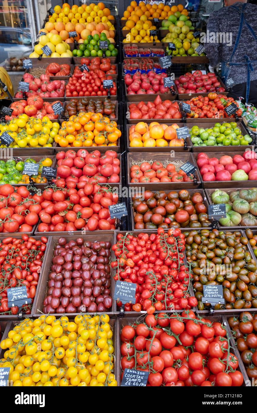 Display of tomatoes tomato varieties for sale outside at Bora & Sons