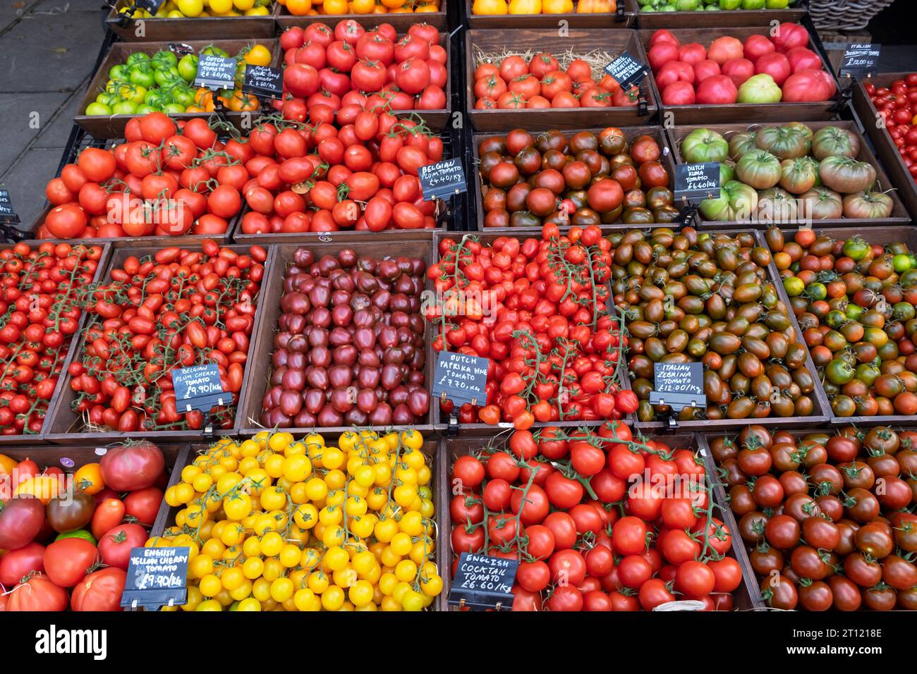 Display of tomatoes tomato varieties for sale outside at Bora & Sons