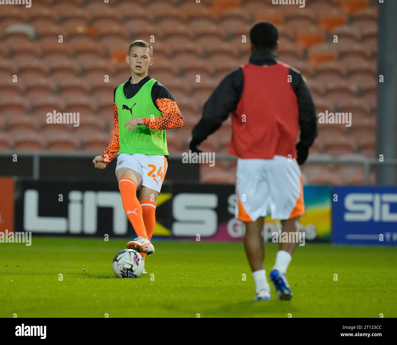 Andy Lyons 24 of Blackpool warms up before the EFL Trophy match
