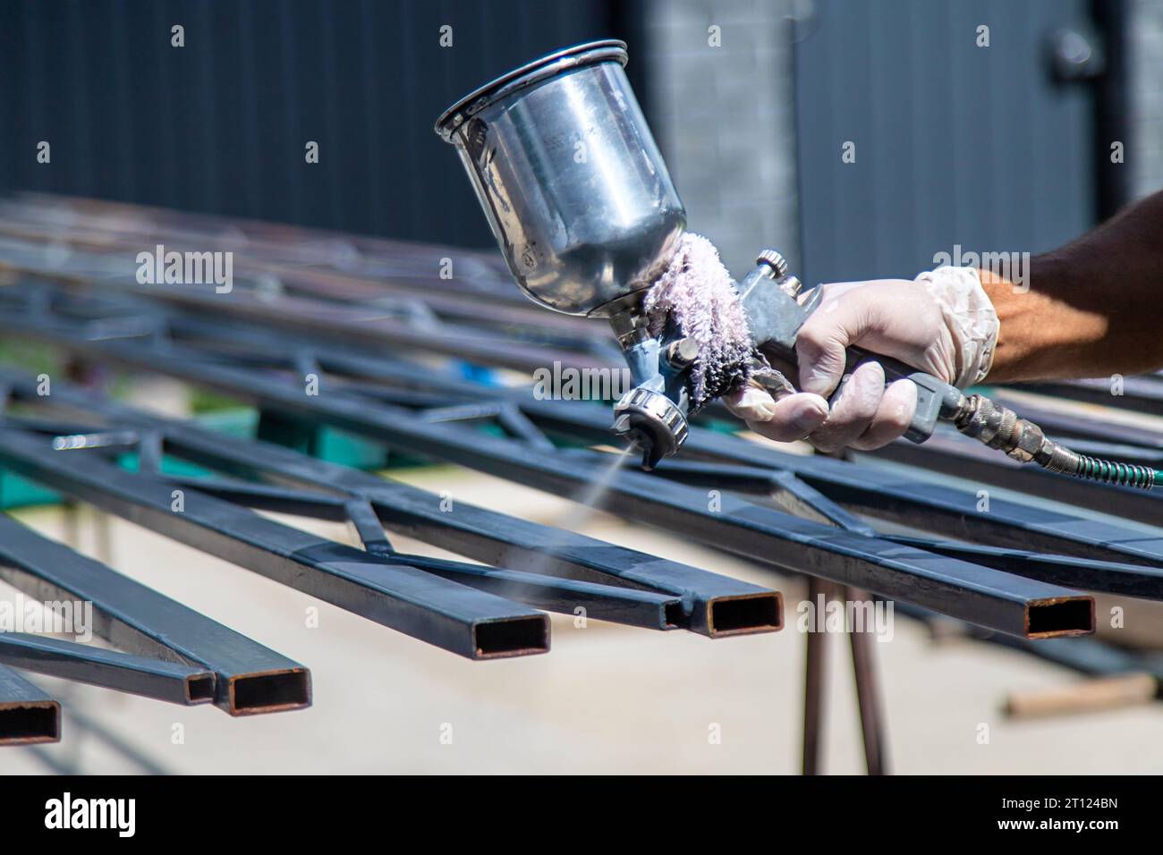 Powder coating man spray gun hi-res stock photography and images - Alamy
