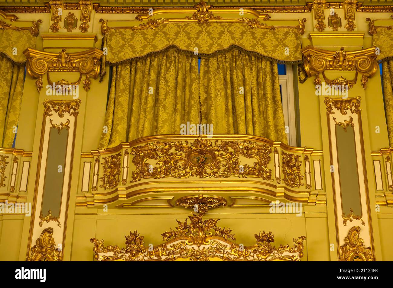 In indoor balcony with a drape holder. Gold-colored luxurious ...