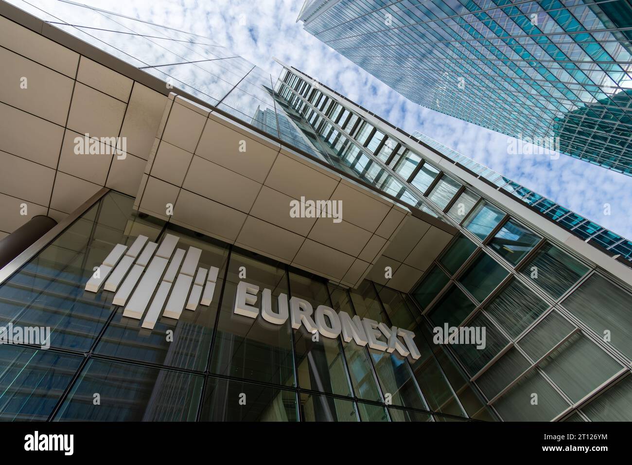 Sign and logo at the entrance to the Euronext building in the Paris La Defense business district. Euronext is the main stock exchange in the euro zone Stock Photo