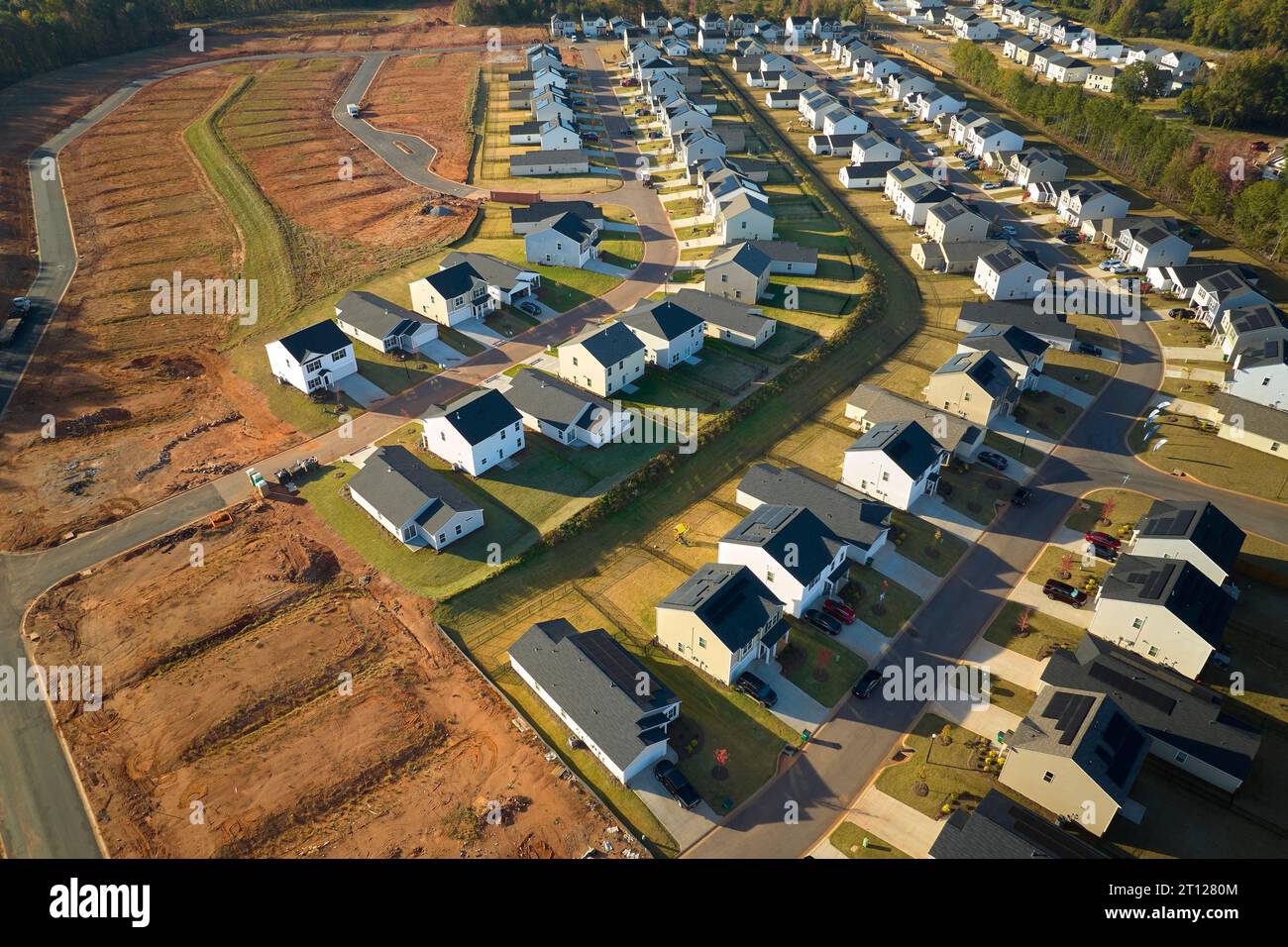 Aerial view of construction site with new tightly packed homes in South ...