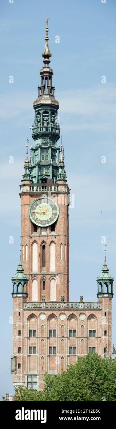The vertical panoramic view of historic 15th century 83 meter high tower of Town Hall in Gdansk city (Poland). Stock Photo