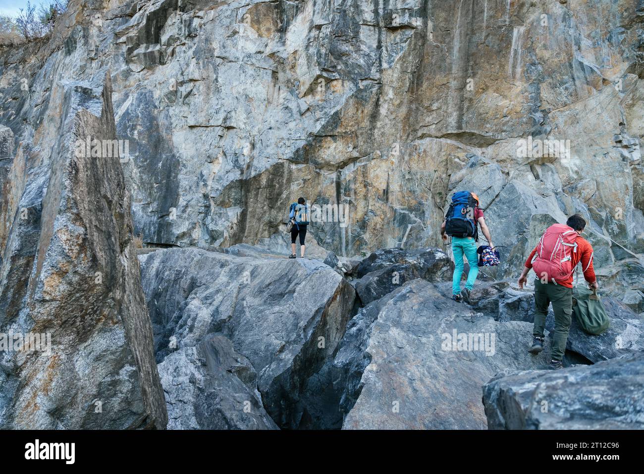 Three young persons on rock hi-res stock photography and images - Alamy