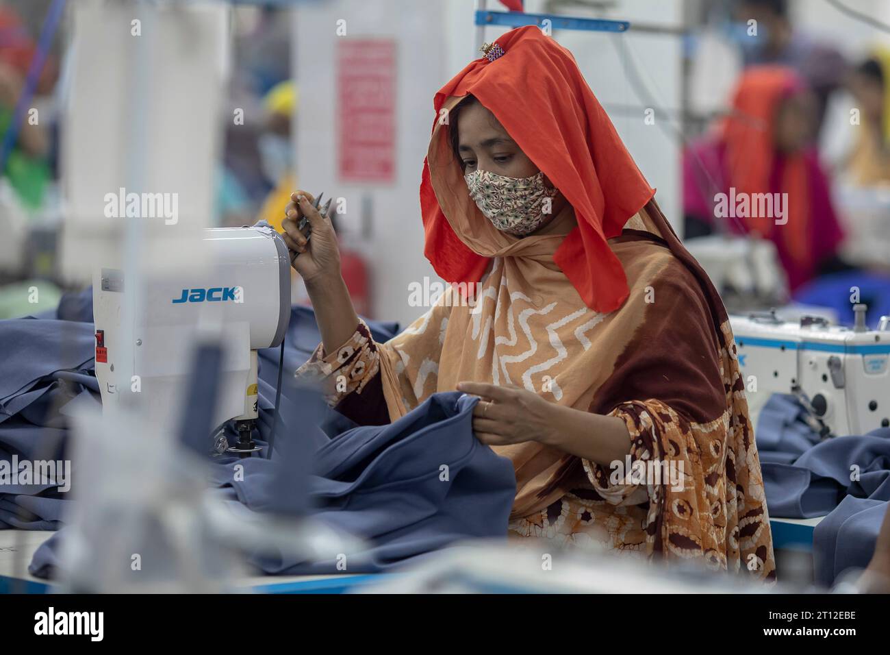 A garment worker works in a sewing section at the Surma Garments