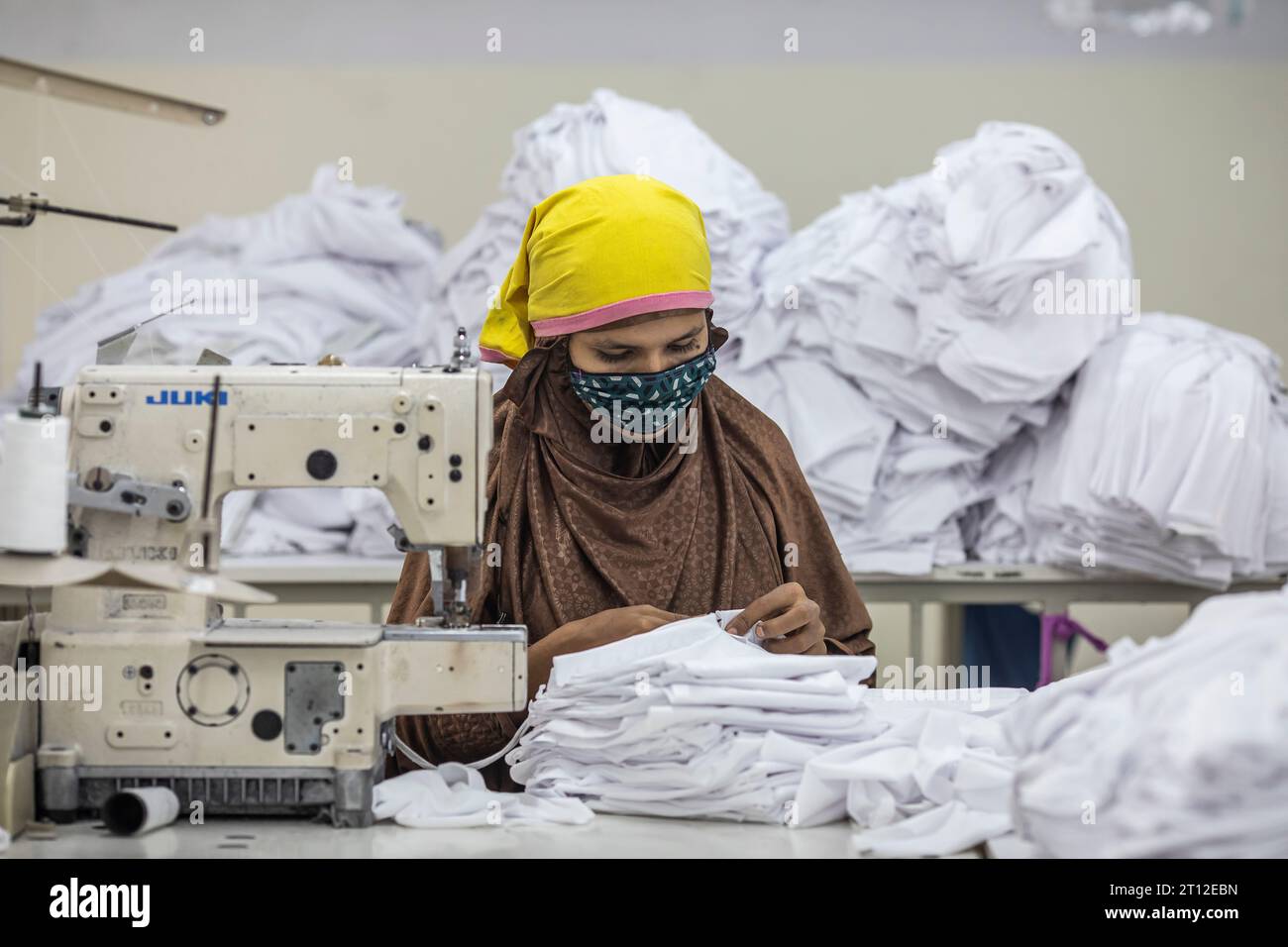 A garment worker works in a sewing section at the Surma Garments