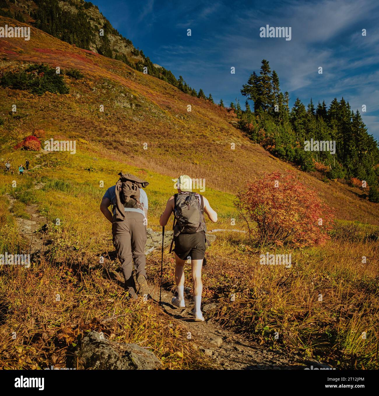 Two men hiking climbing hi-res stock photography and images - Alamy