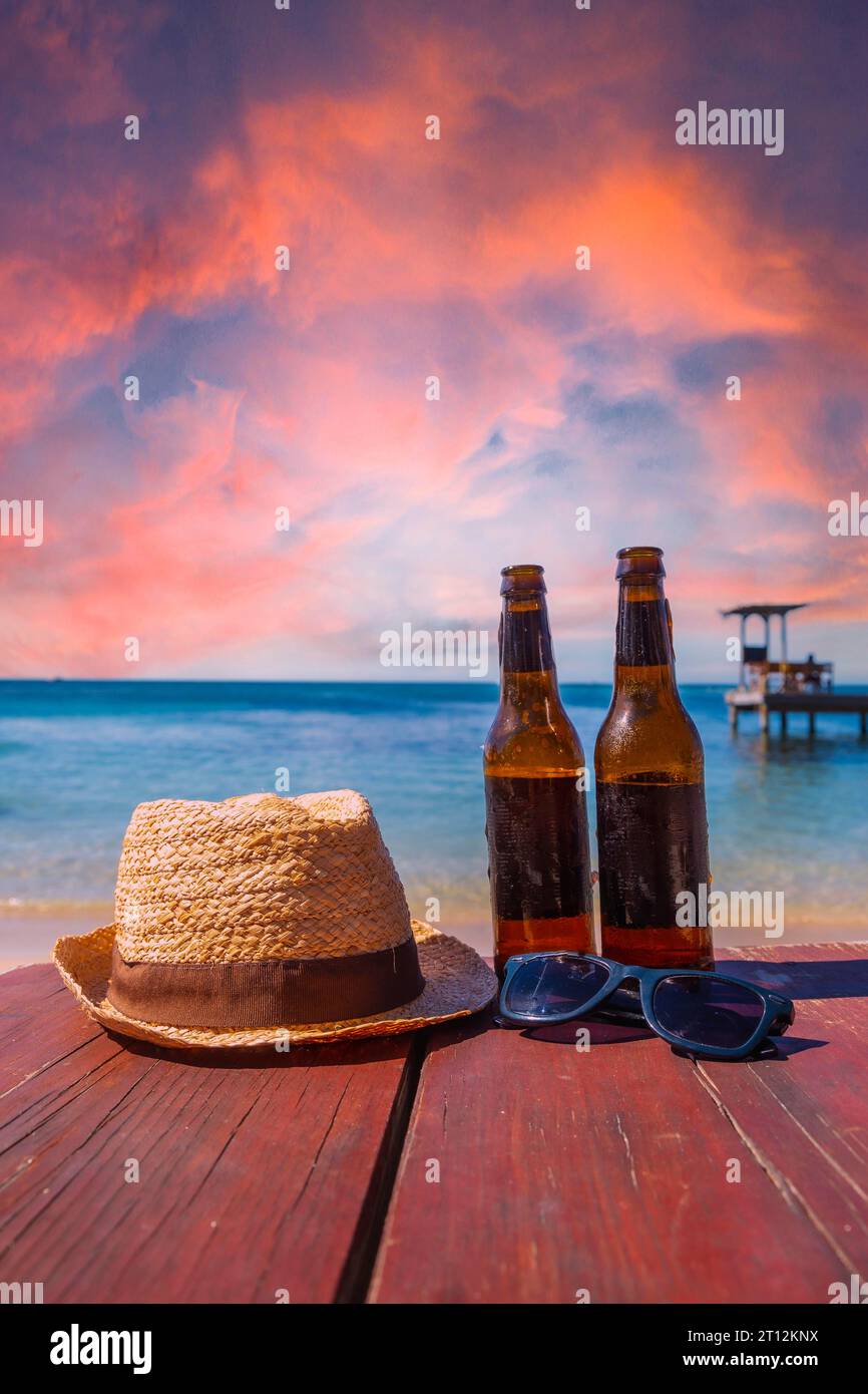 Two beers on West End beach on Roatan Island. Honduras Stock Photo - Alamy